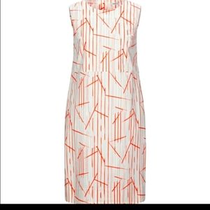 Sleeveless White and Orange Patterned Dress